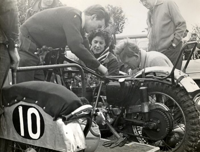Bike grass-track meeting at Langley in September 1957-59.  Left to right: Unknown, Connie Clark, Peter Clark, Mr Greenshields